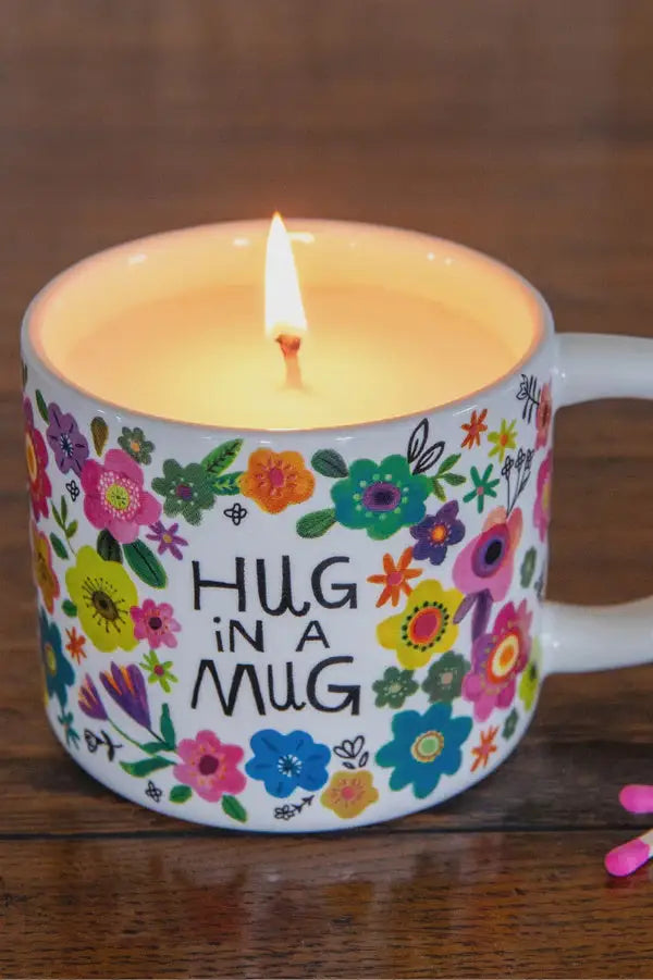 Floral mug candle from Natural Life, perfect for women’s boho chic clothing lovers