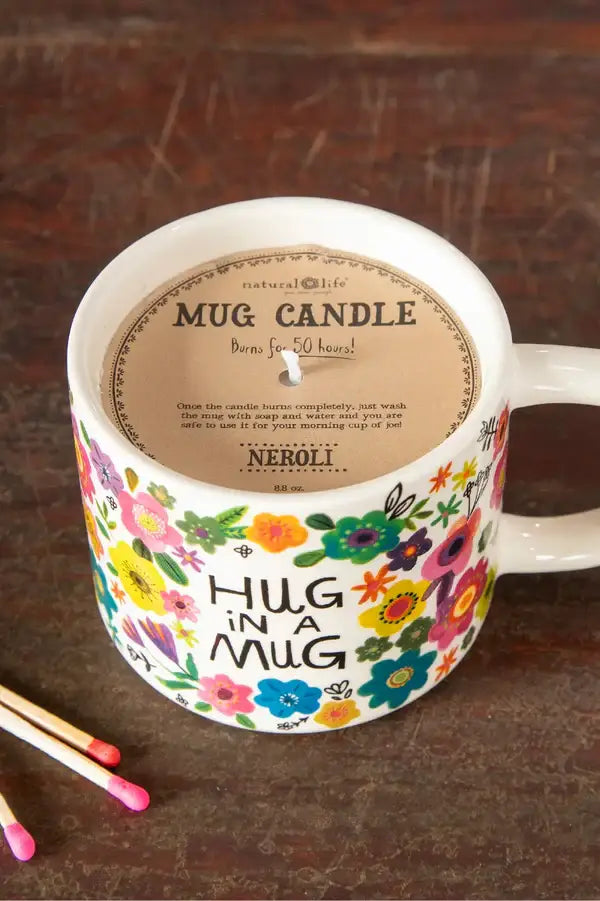 Floral mug candle from Natural Life, perfect for women’s boho chic clothing lovers