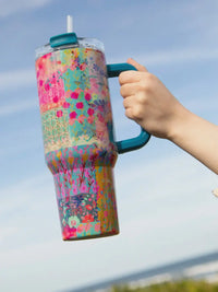 Floral patchwork travel mug handle in MEGA 40OZ TUMBLER, a stylish stainless steel design