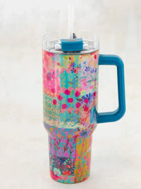 Floral patchwork travel mug with handle, perfect for women’s boho chic clothing enthusiasts