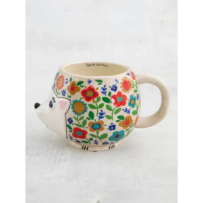 Floral-patterned ceramic hedgehog mug from Shop Daisy, perfect for folk art enthusiasts