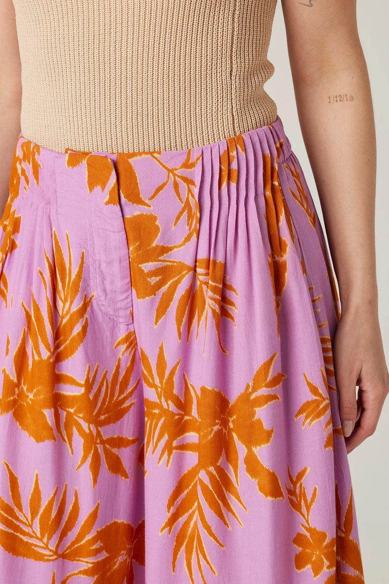 Floral patterned pleated skirt in pink and orange for boho wide leg pant style