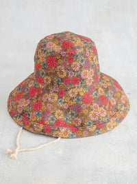 Floral patterned sun hat with chin strap from SUNNY DAY BUCKET HAT for women’s boho chic clothing