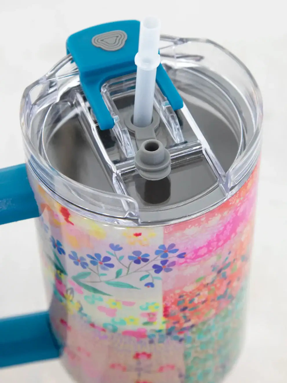 Floral-patterned stainless steel tumbler with straw and handle for stylish hydration