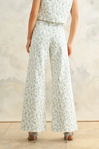 Floral print stretched pants displaying wide-leg floral-patterned design for women