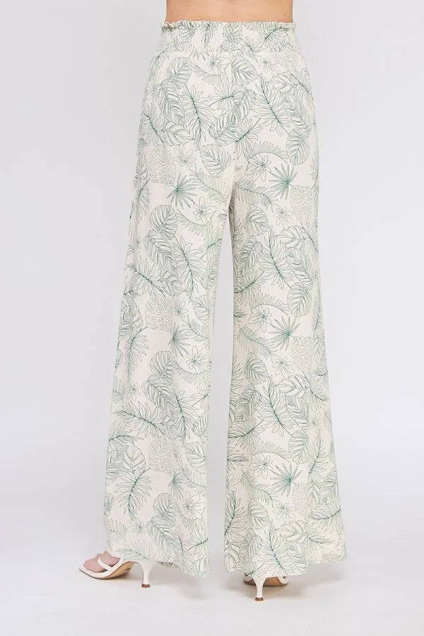 Floral-patterned linen smocked tie waist wide leg pants for a chic summer look