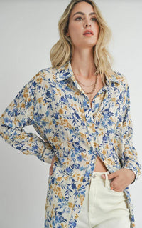 Blonde woman wearing Floral Print Button-Up Shirt with Heirlooms Duster Dress