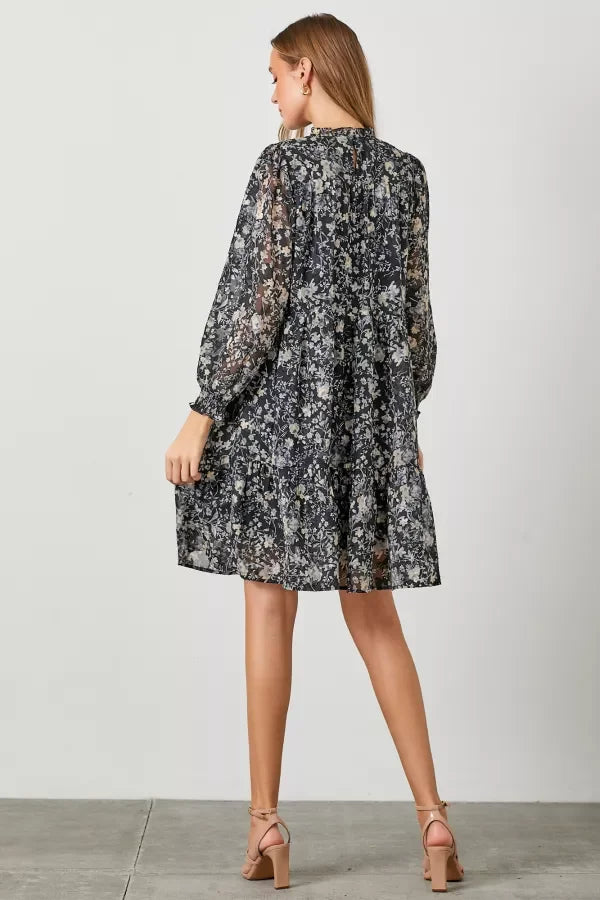 Floral print chiffon dress with smocked yoke and tiered skirt for a boho style