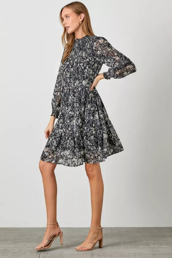 Floral print long-sleeved dress with smocked yoke and flared skirt in boho style