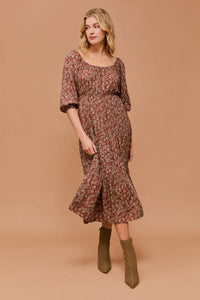 Floral print dress with puff sleeves and flared skirt in open floral design