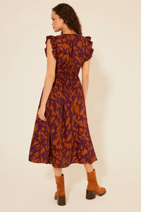 Floral print PASEO DE ORO DRESS features ruffled cap sleeves and a fitted waist