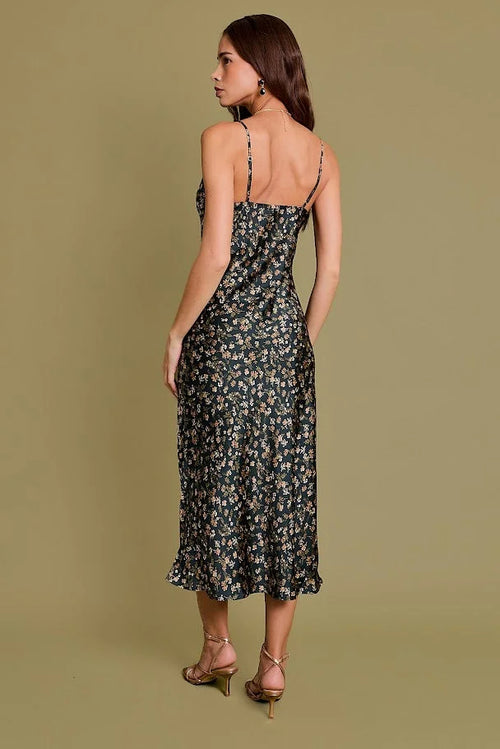 Floral print maxi dress with spaghetti straps showcases women’s boho chic style