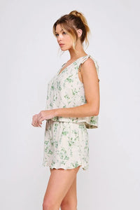 Printed linen shoulder romper with drawstrings showcasing a stylish blend design