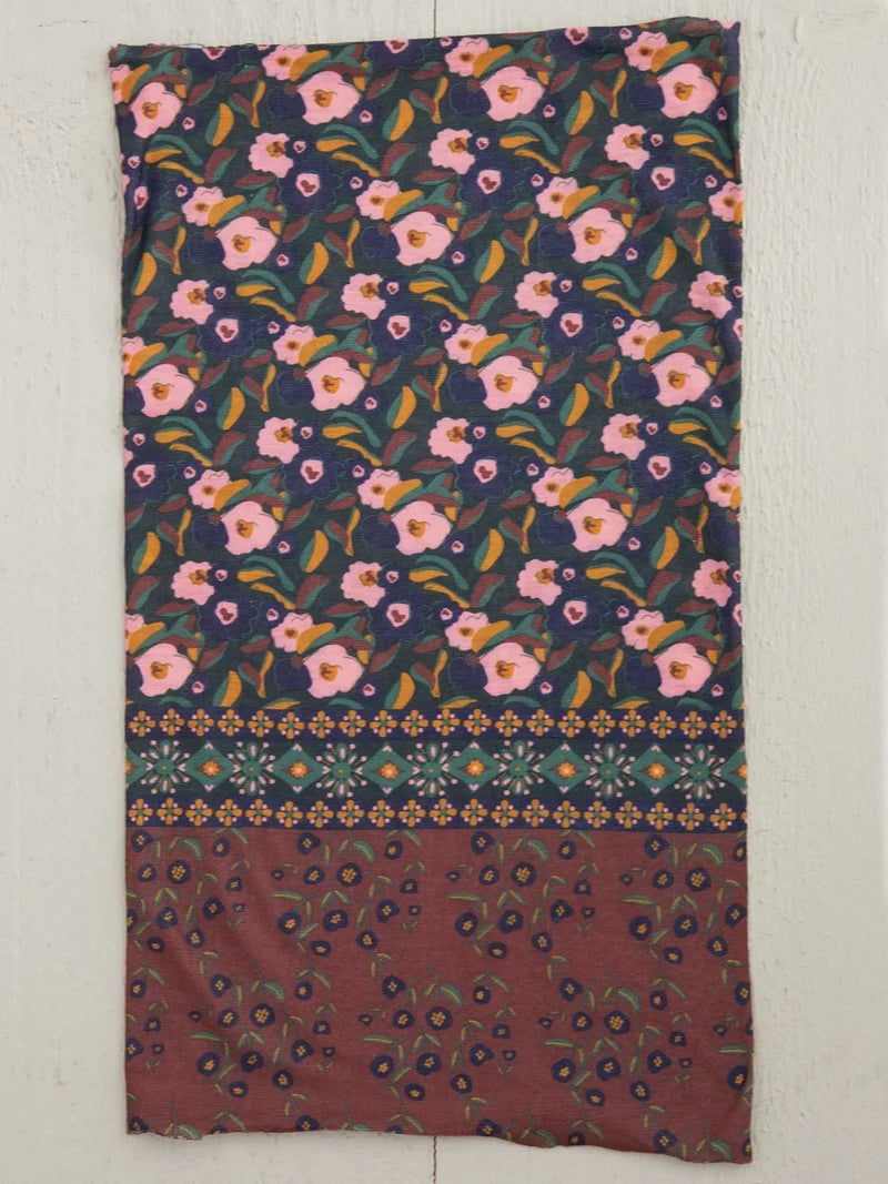 Floral print scarf displayed on a wall, showcasing the FULL BOHO BANDEAU headwrap