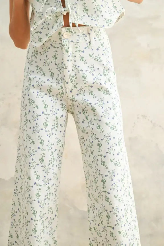 Floral print stretched pants with wide-leg design from FLORAL PRINT STRETCHED PANTS collection
