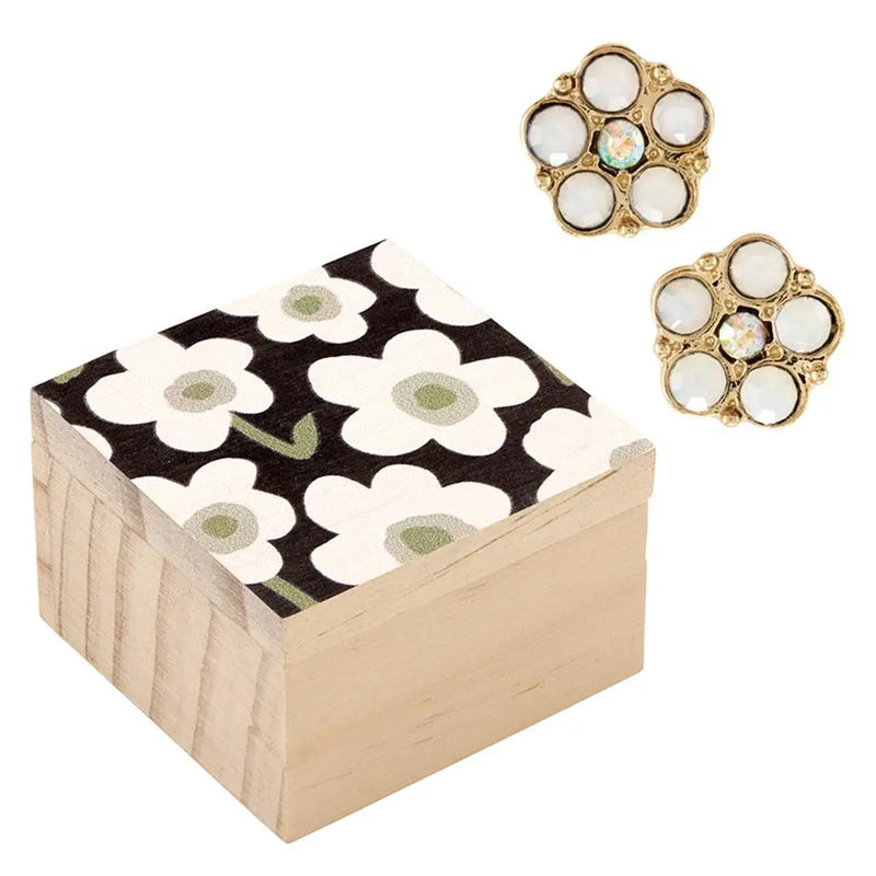 Floral-topped wooden box displaying Crystal Daisy Earrings with daisy flower earrings design