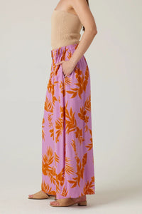 Flowy pink HILLCROFT WIDE-LEG PANT with orange leaf print for a boho look