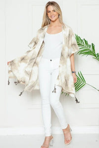 Flowy Mellow Melanie marble print kimono coverup with tassels over a white outfit