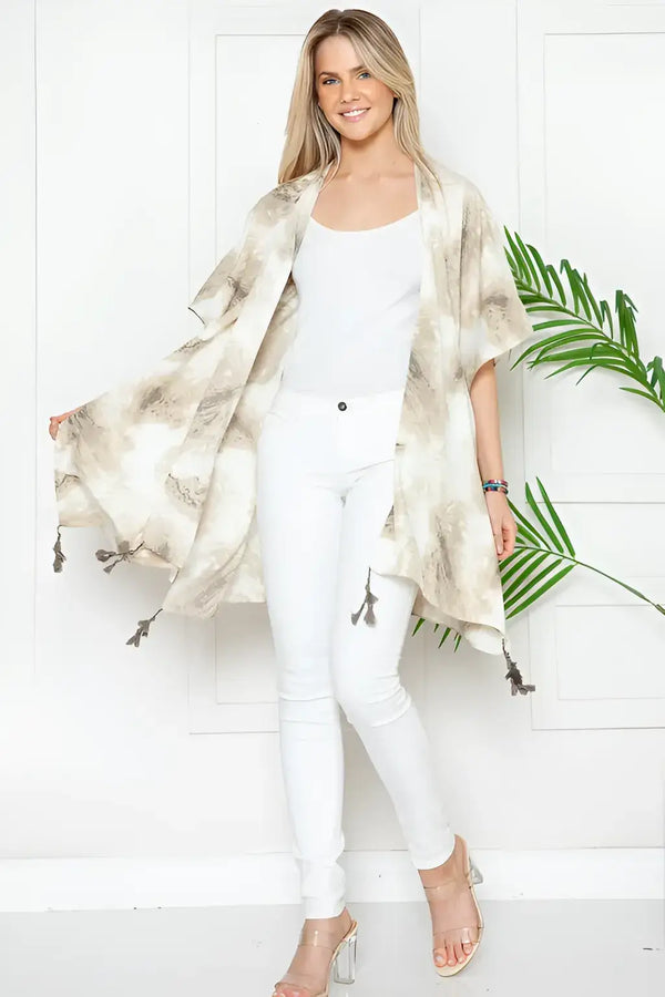 Flowy Mellow Melanie marble print kimono coverup with tassels over a white outfit