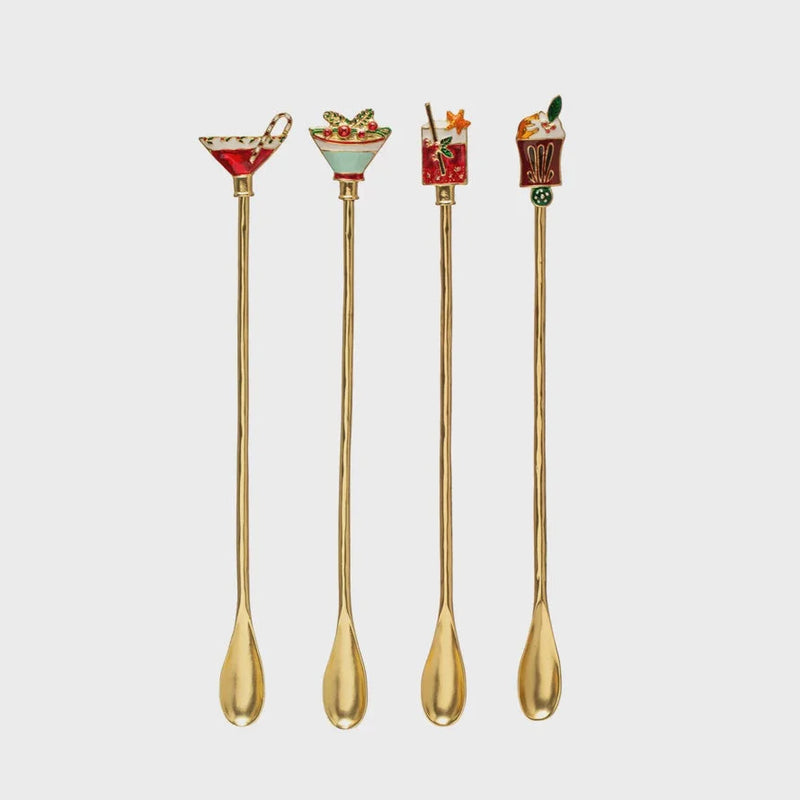 Four gold-toned cocktail spoons with enameled handles featuring decorative toppers