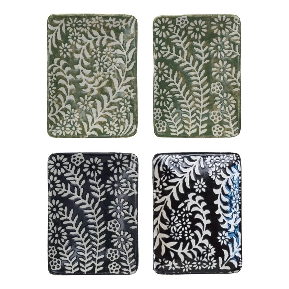 Four embossed floral ceramic tiles on a stoneware dish, ideal for women’s boho chic clothing shop Daisy