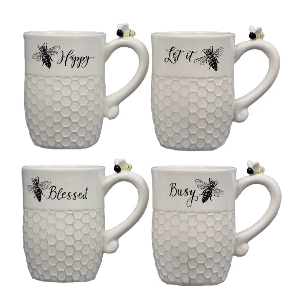 Ceramic white bee mugs featuring honeycomb textures and uplifting words displayed elegantly