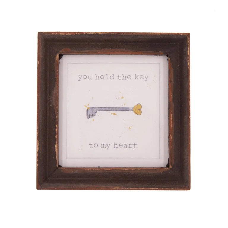 Heart wood framed decor featuring a quote in a small wooden frame design