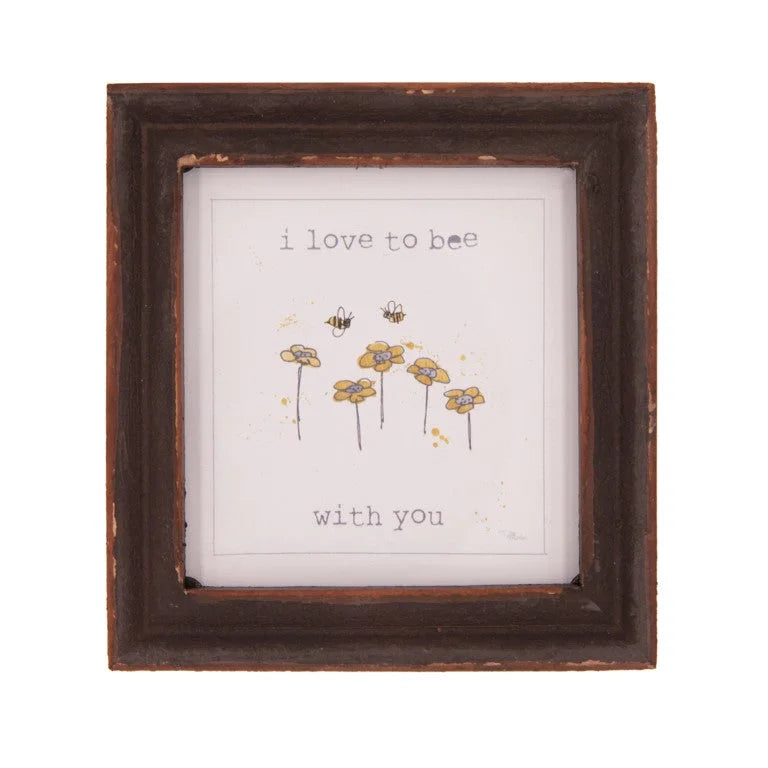 Wooden frame features a picture of two flowers with love is what you are, ideal wood framed decor