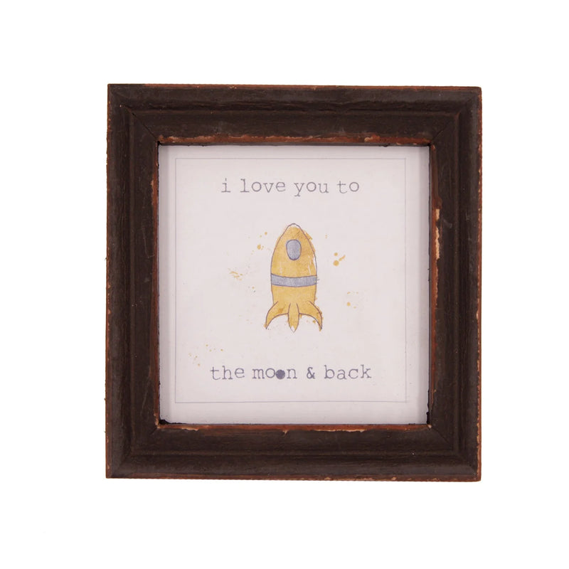 Framed picture of a yellow rocket ship design with loving words in a small wooden frame