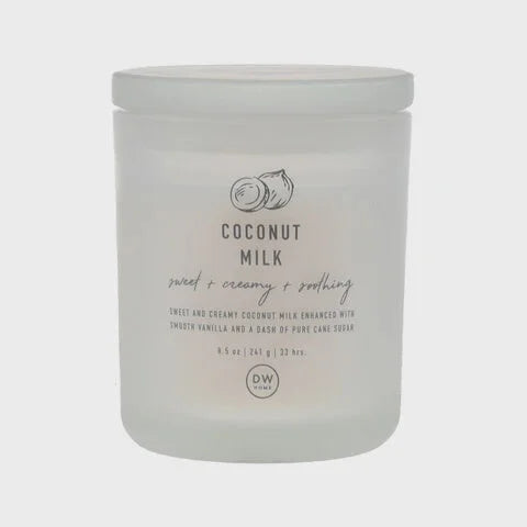 Frosted glass jar of Coconut Milk Candle, perfect for a boho and flowy decor