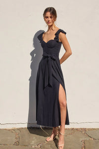 Full-length navy blue corset flutter dress with ruffled cap sleeves and high slit