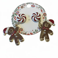 Festive gingerbread man and peppermint dangle earrings with swirls