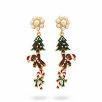 Whimsical Christmas charm dangle earrings with gingerbread man design