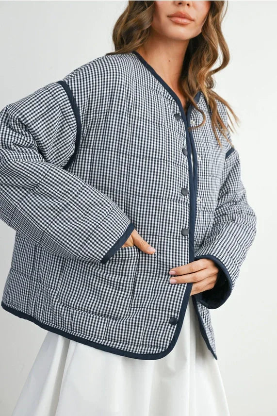 Buttoned quilted puffer jacket in gingham with navy trim and black buttons