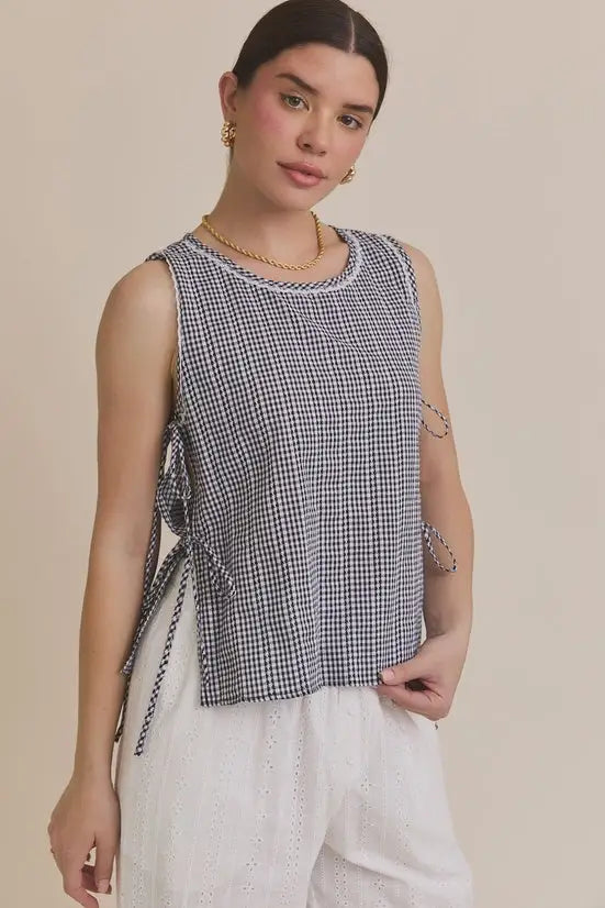 Round neck sleeveless gingham top with side ties for stylish summer wear