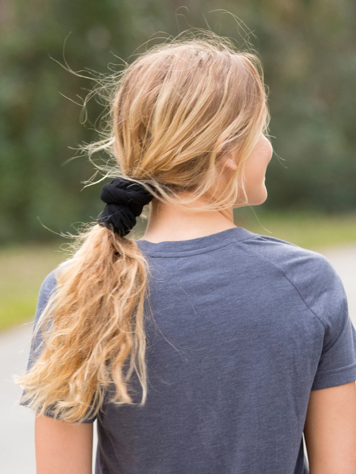 Little girl with blonde hair in a boho bandeau headband showcasing style and comfort