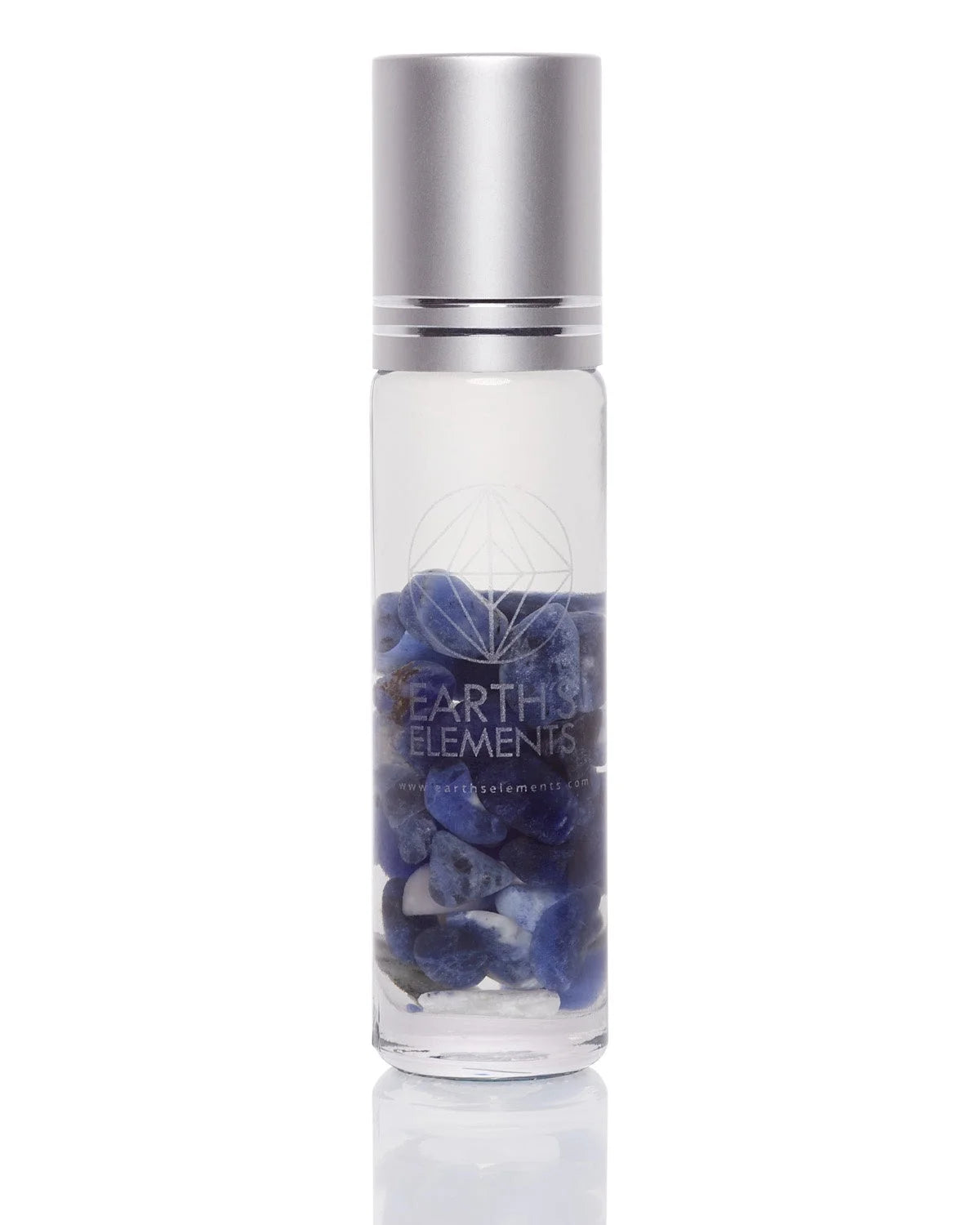 Glass bottle with blue flower petals labeled Earth Elements for organic essential oils