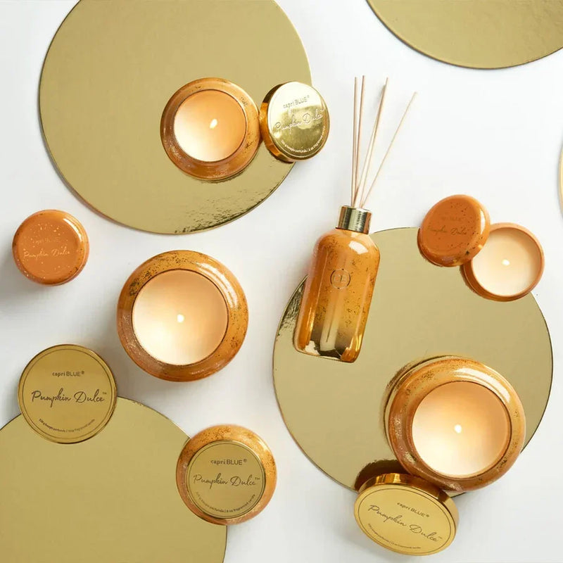 Gold and amber glass Pumpkin Dulce Tin Glimmer Mini Candle with Pumpkin Spice scent