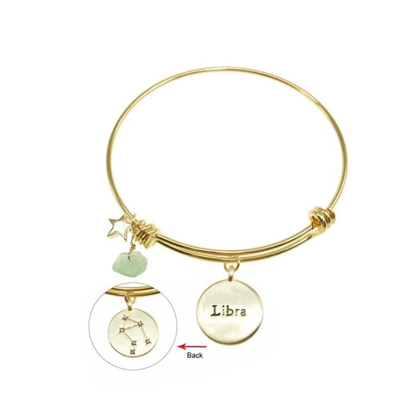 Gold bang bracelet with initial charm, featuring Libra zodiac sign in 20 karat gold plated design