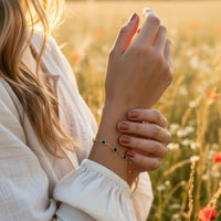 Gold dipped dainty clover bracelet in gold and black geometric design for women’s boho chic style