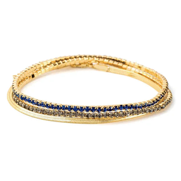 Gold bracelet with blue sapphire stones from the Sparkle & Shine Rhinestone Bracelet Trio