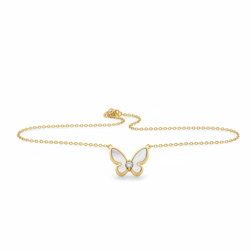 Gold butterfly anklet with diamond accent from the Gold Wings Pearl Butterfly Necklace bohemian jewelry collection, embodying free spirit
