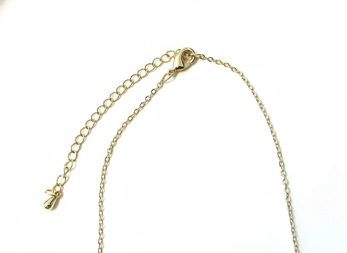 Boho gold layered charm necklace with lobster clasp extender