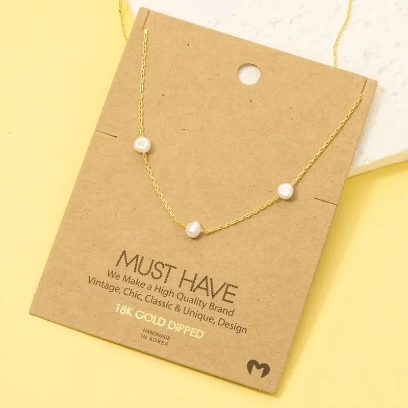 Gold dipped dainty three pearl charm necklace with elegant design for women