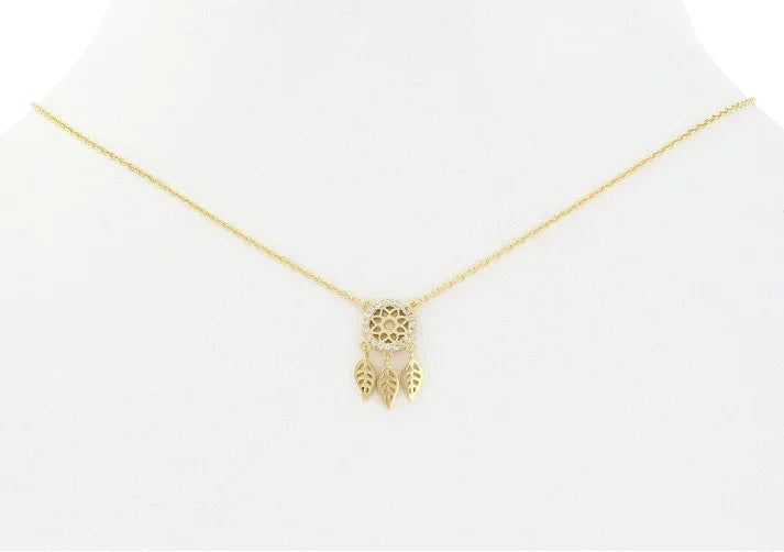 White Diamonds Pavè Dream Catcher Necklace featuring gold chain, dream catcher pendant, and leaf charms