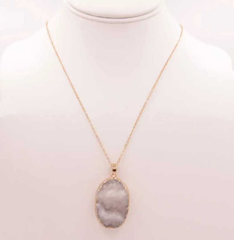 White quartz genuine stone necklace featuring a gold chain and oval druzy pendant
