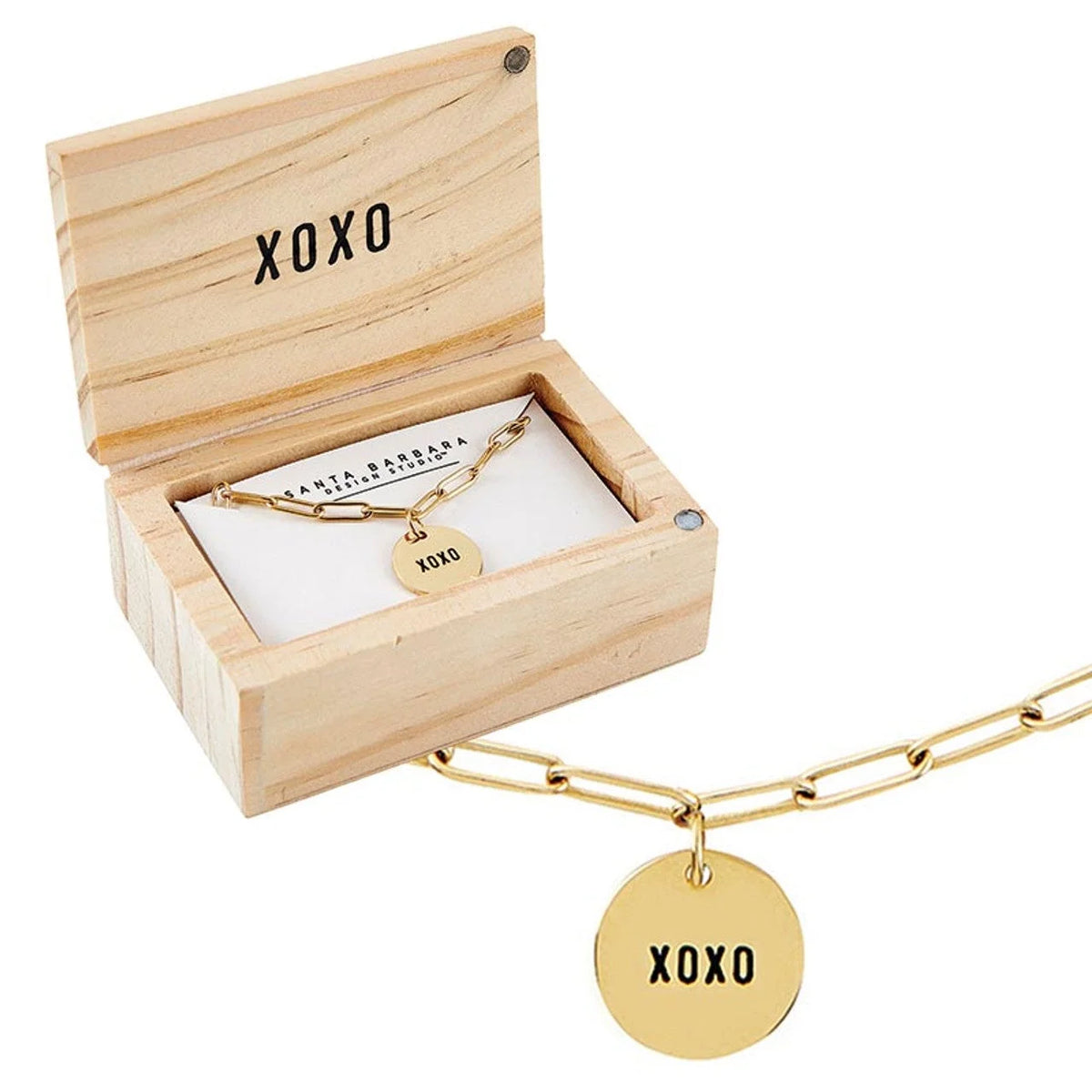 Gold chain link necklace with XOXO charm in a wooden box from Shop Daisy