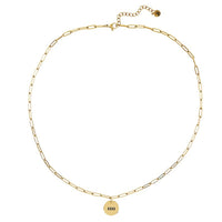 Gold Chain XOXO Necklace featuring a circular pendant charm, perfect for women’s boho chic clothing