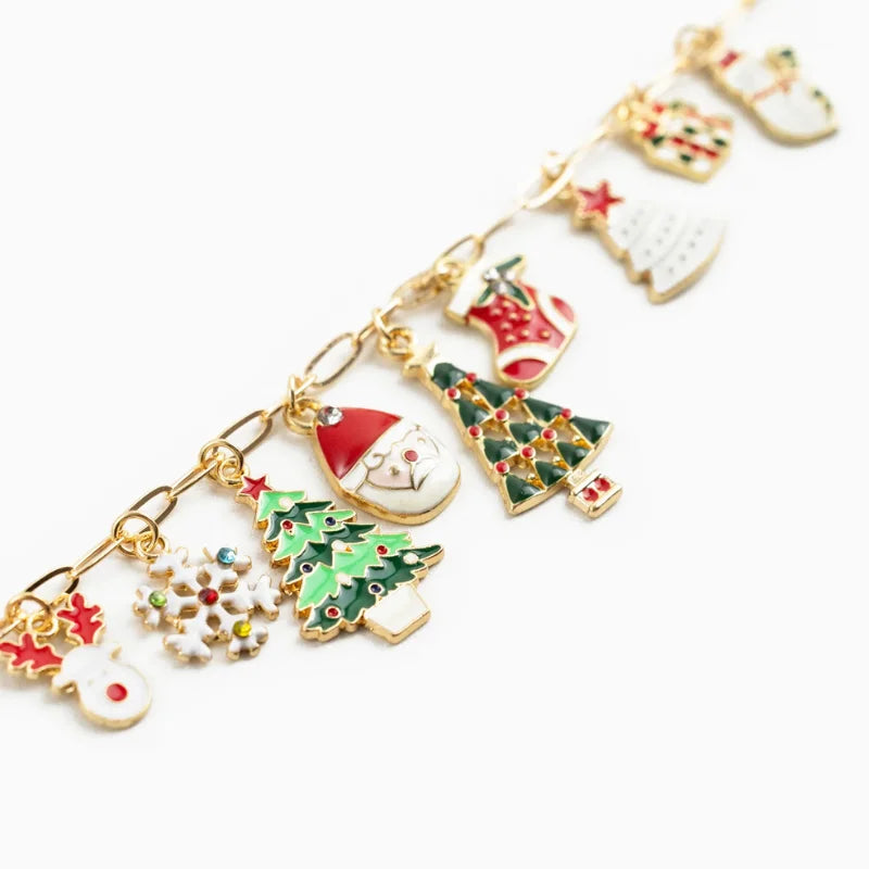 Classic Christmas charm bracelet with gold, enamel, and rhinestones