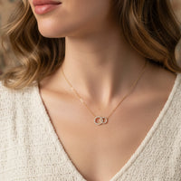 Gold interlocking circle necklace with cubic zirconia accents, zirconia interlocking promise